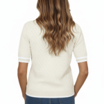 Women's VALE botanical graphic knit polo shirt in breathable pique cotton, featuring diamond texture and vintage floral compass design.