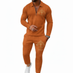 Men's 2-piece breathable cotton tracksuit featuring a quarter-zip polo shirt and matching joggers with a gold Tree of Life compass logo, available in Navy, Maroon, and Orange.
