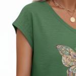 Women's breathable cotton V-neck t-shirt featuring a colorful mandala butterfly graphic and "Vale" script in Sage Green, Rose Pink, and Cream.
