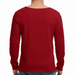 "Man wearing a VALE brand long sleeve cotton shirt featuring a vintage gold nautical compass graphic on the chest, available in black, forest green, and burgundy."