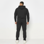Men's premium breathable cotton tracksuit featuring a full-zip hoodie and matching joggers with minimalist branding, available in Black, Green, and Blue.