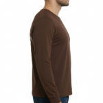 Back view of a man wearing a VALE graphic long-sleeve cotton shirt featuring a vintage gate design and Roman numerals MCMXCIX.