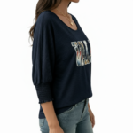 Women's breathable cotton scoop neck shirt featuring a floral 'VALE' graphic and smocked 3/4 sleeves, available in Charcoal, Navy, and Green.