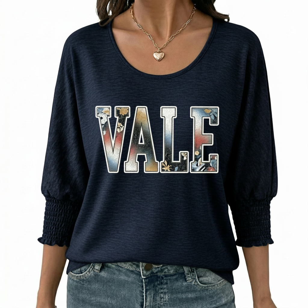 Women's breathable cotton scoop neck shirt featuring a floral 'VALE' graphic and smocked 3/4 sleeves, available in Charcoal, Navy, and Green.